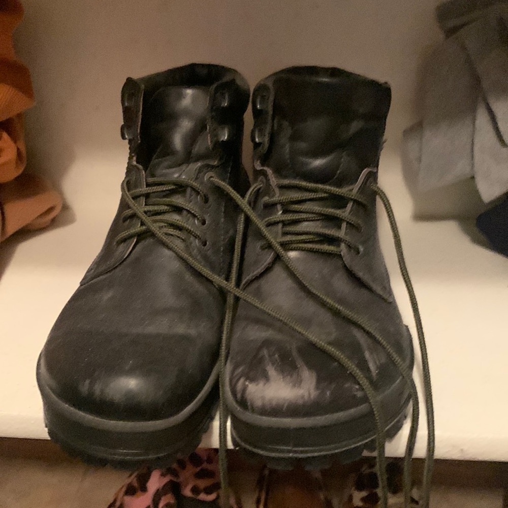 Barely worn size 40 Birkenstock boots with scuff on the left boot (shown)